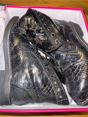 Vince Camuto Black Snake-Embossed Combat Boots with Gold Accents